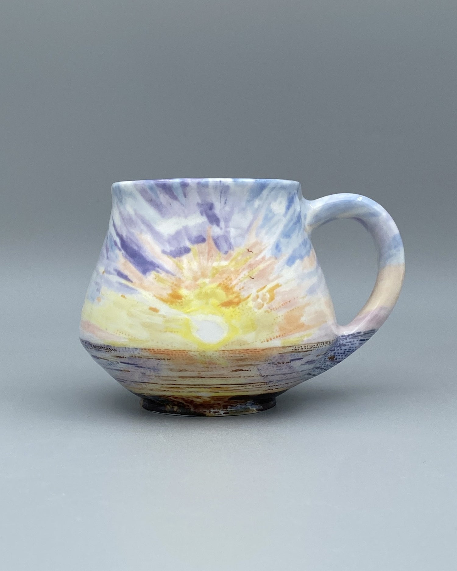 porcelain mug with sun rise